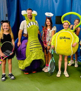 tennis players dressed in costumes for a halloween match