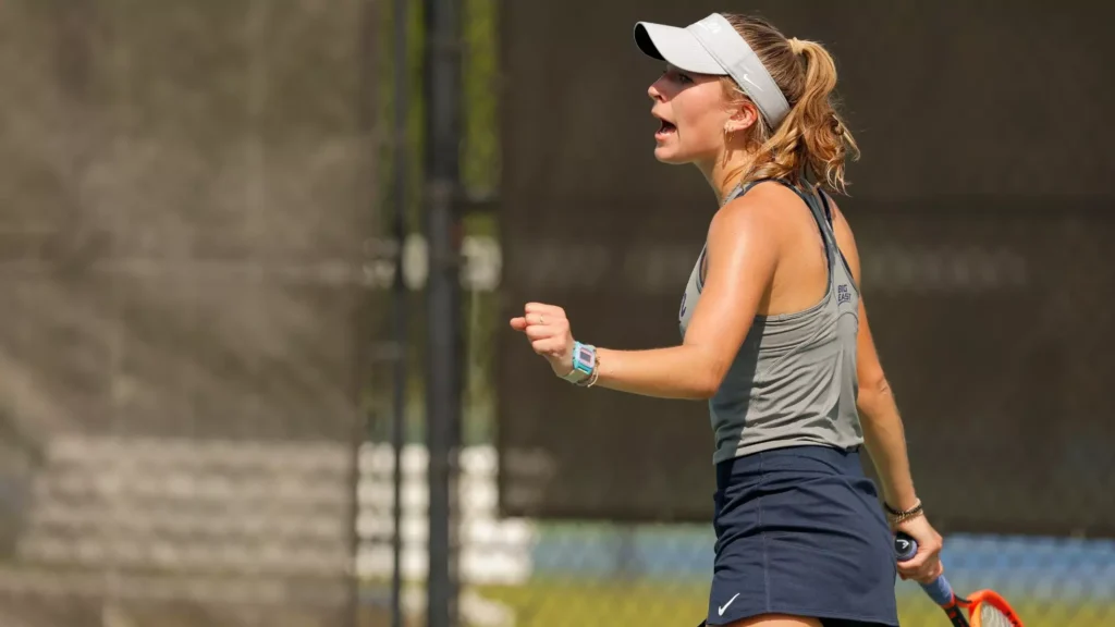 tennis player celebrates