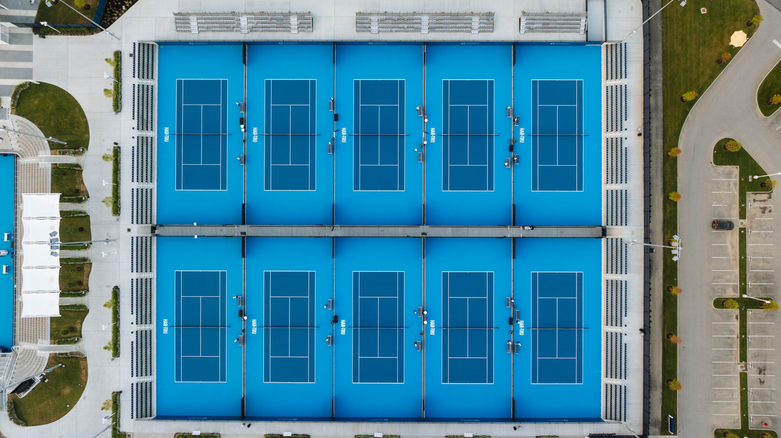 Drone picture of ten outdoor tennis courts at the Cincinnati Open Sporting Club