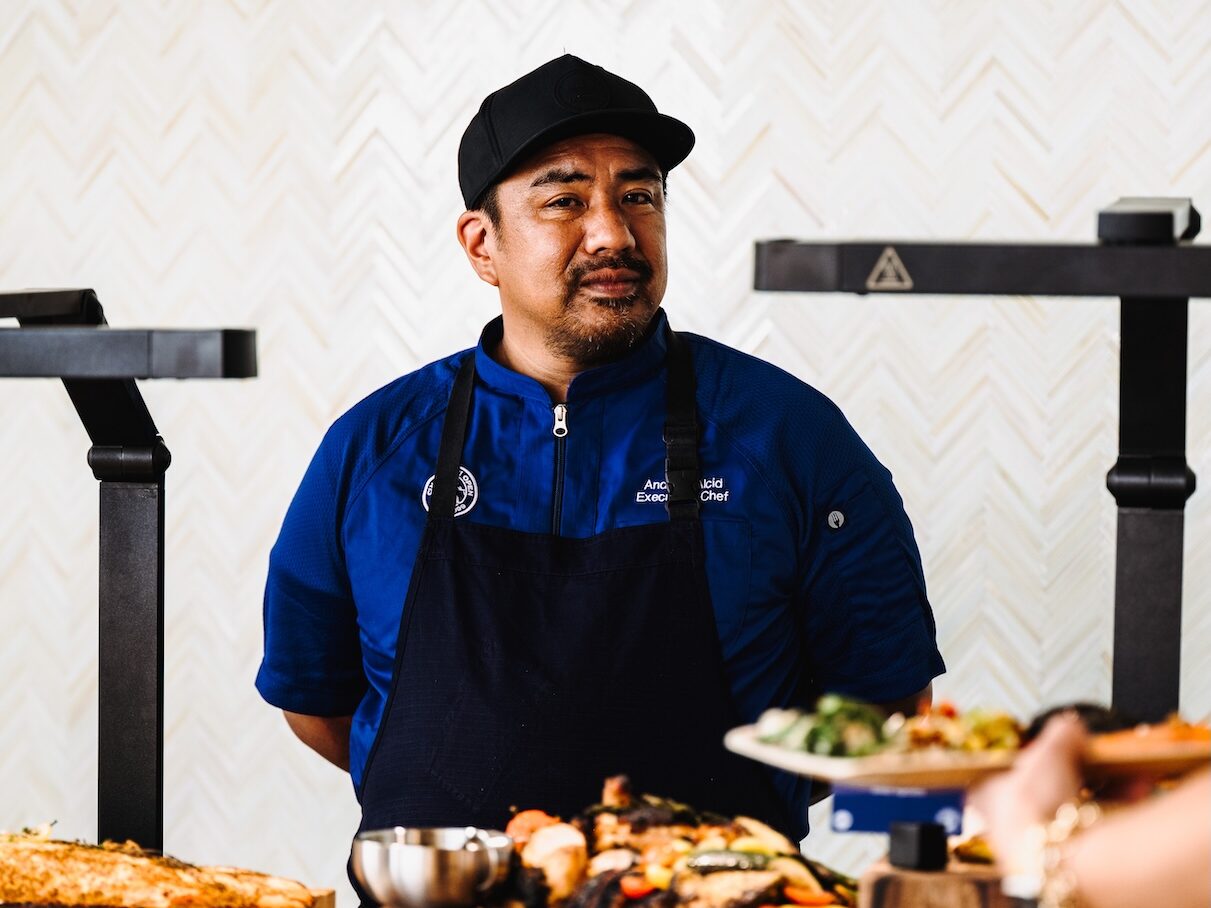 chef andrew standing with his buffet